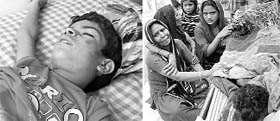 Shatterd Wailing relatives of the two children who died after a wall collapsed due to strong winds on Sunday.