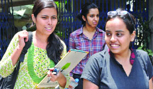 Students come out after taking the UPSC exam in New Delhi 