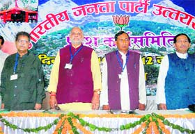 Bishan Singh Chufal (second from right), president of the Uttarakhand unit of the BJP, with other senior leaders at a meeting of the state executive committee at Almora on Sunday