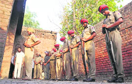 Guard of honour being given to ASI Gurdial Singh during his cremation in Ludhiana on Sunday.
