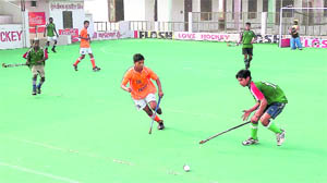 A match in progress during the Prithipal Singh six-a-side Hockey Festival at Jarkhar near Ludhiana on Sunday. 