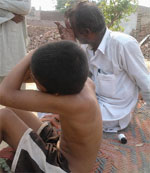 Mentally retarded Kuldeep Singh at his home in Nainewaal village.