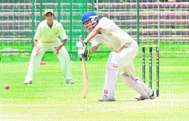 A player executes a shot during the match between Chandigarh and Ludhiana at the Sector 16 Cricket Stadium in Chandigarh on Monday.