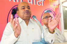 Thavar Chand Gehlot, BJP general secretary and in charge of Uttarakhand party affairs, addresses a press conference in Dehradun on Monday. 