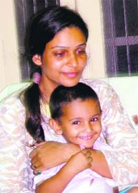 RELIEF, AT LAST: Sampa Arya, wife of one of the released sailors, Ravinder Singh, talks to mediapersons at Rohtak on Monday