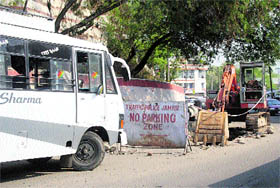 A bus parked in the no parking zone near the bus stand in Jammu on Monday.