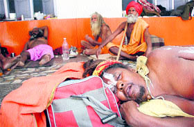 Sadhus, who arrived in Jammu to proceed on the Amarnath yatra, rest at Geeta Bhawan on Monday.