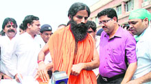 Baba Ramdev after being discharged from hospital at Jollygrant on Tuesday. 