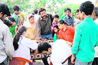 Patients being examined at a free health camp organised by SGRR Medical College in Dehradun on Tuesday. 