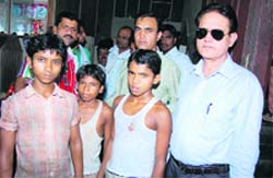 Officials of the Labour Department with child labourers at Sirsa
