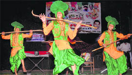 Students perform bhangra on the concluding day of the cultural camp organised by the Dhol Lovers Folk Academy at Desh Bhagat Yadgaar Hall in Jalandhar on Sunday.