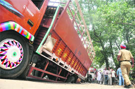 A truck stuck in a caved-in portion of the road opposite the mini-secretariat in Ludhiana on Tuesday.