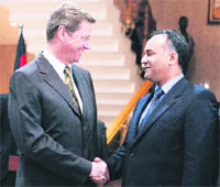 German Foreign Minister Guido Westerwelle (left) with Ali al-Essawi, in charge of foreign affairs in Libyas rebel National Transitional Council, in Benghazi. 