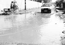 Cesspool Rainwater accumulated on a link road near the level crossing in Sector 19, Panchkula.