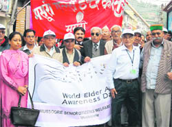   Senior citizens along with MLA Jot Singh Gunsola (extreme right) at a march in Mussoorie 