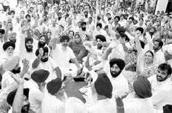SAD-BJP alliance leaders stage a dharna against rising prices and corruption outside the Deputy Commissioners office in Mohali on Thursday