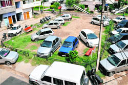 Cars kept at a park in residential area of Sector 45, Chandigarh