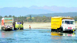 Quarrying being done in the Yamuna riverbed in Dehradun district