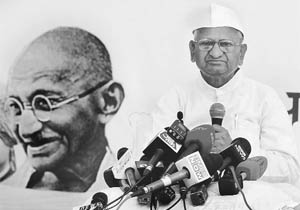 Social activist Anna Hazare sits during his 'fast unto death' against corruption in New Delhi. 