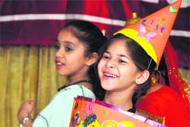 All smiles Children at a fancy-dress competition organised by Arsee Ladies Club in Ludhiana on Thursday.