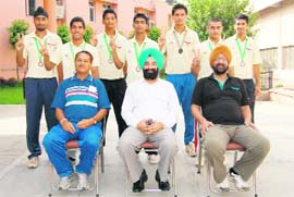 Trainees of the Sports Authority of India Training Centre with their coaches in Ludhiana. 