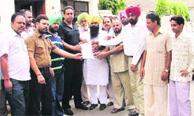 Residents of Ludhiana South show the report of the water samples that failed the potability test. 