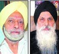 Chief Khalsa Diwan president Charanjit Singh Chadha (R) replaces honorary secretary Bhag Singh Ankhi (L) with Sarbjeet Singh