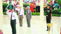 Veteran soldiers of the 1961 pass-out batch pay homage at the martyrs memorial during the golden jubilee reunion at the Indian Military Academy in Dehradun on Saturday.