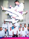 A player in action during a tae kwon do training camp at Punjabi University in Patiala