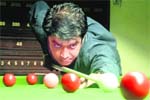 Sandeep Duggal plays a shot against Abhinav during the 27th State Saurabh Khattar Memorial Billiards and Snooker meet in Chandigarh