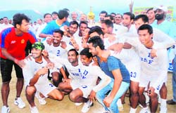 The BSF (Jalandhar) team celebrate their title victory in the All-India Football Tournament held at Pithoragarh