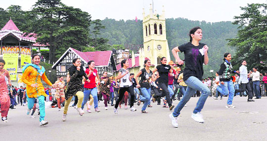 Children participate in a marathon against corruption on the Ridge in Shimla on Saturday.