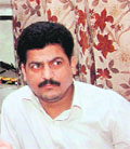 BSP leader Intezar Abdi Bobby (R) at a police station in Lucknow on Sunday.