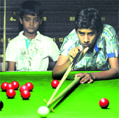 Players in action during the 27th State Saurabh Khattar Memorial Billiards and Snooker Championship at Sector 22 in Chandigarh on Monday