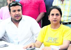 Sanjay Sharma, owner of Sanjay Karate School, addresses mediapersons in Jalandhar on Monday