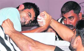 Players in action during the 35th National Arm Wrestling Championship-2011 in Ludhiana.