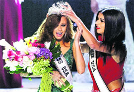  Miss California Alyssa Campanella is crowned as the 2011 Miss USA by last years winner Rima Fakih in Las Vegas on Sunday. 