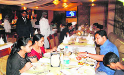 People enjoy Mediterranean cuisines at a food festival in Amritsar. 
