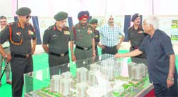 Lt Gen S R Ghosh, GOC-in-C, Western Command (left) along with Lt Gen Mukesh Sabharwal, Adjutant General at Army HQ (second from left) and other senior officers look at the AWHO project model in Mohali