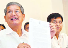 Harish Rawat, Union Minister of State for Food Processing and Agriculture, addresses a press conference in Dehradun on Tuesday. 