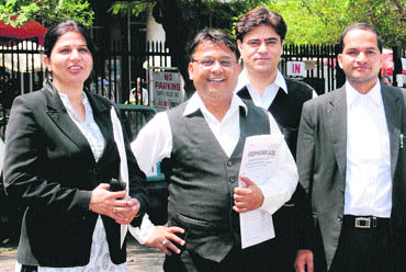Young lawyers outside a court