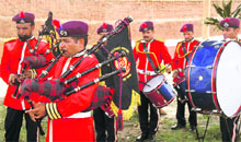 Inmates of the Kot Bhalwal prison perform on World Music Day in Jammu on Tuesday