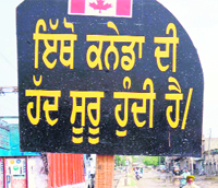 A signboard saying Boundary of Canada starts from here on the Raikot Road, Jagraon