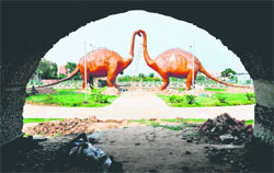 Replicas of dinosaurs at the entrance of the Valley of Animals in Sector 49.
