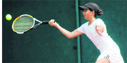 A player in action in the All-India Talent Series Tennis Tournament at the Shanti Tennis Academy in Dehradun on Wednesday. 