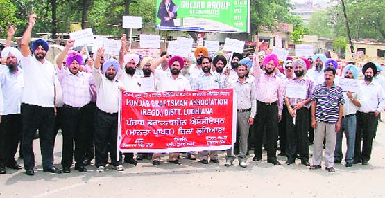Draftsmen hold a protest rally on the fifth day of their pen-down strike at mini-secretariat in Ludhiana