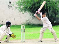 A batsman plays a stroke during the ongoing cricket (U-14) tournament in Chandigarh