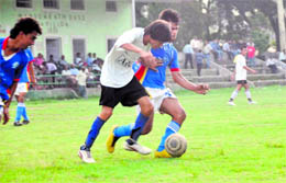 A match in the Lala Nemi Dass Memorial District Football League under way at the Pavilion ground in Dehradun on Thursday.