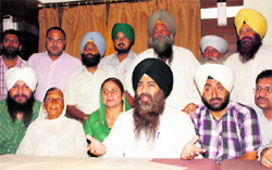 Surjit Singh, president, Dangapeerit Welfare Society (extreme right), addresses a news conference in Ludhiana on Thursday