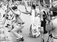 Two persons were killed in a clash between KMSS activists and the police in Guwahati on Wednesday. 